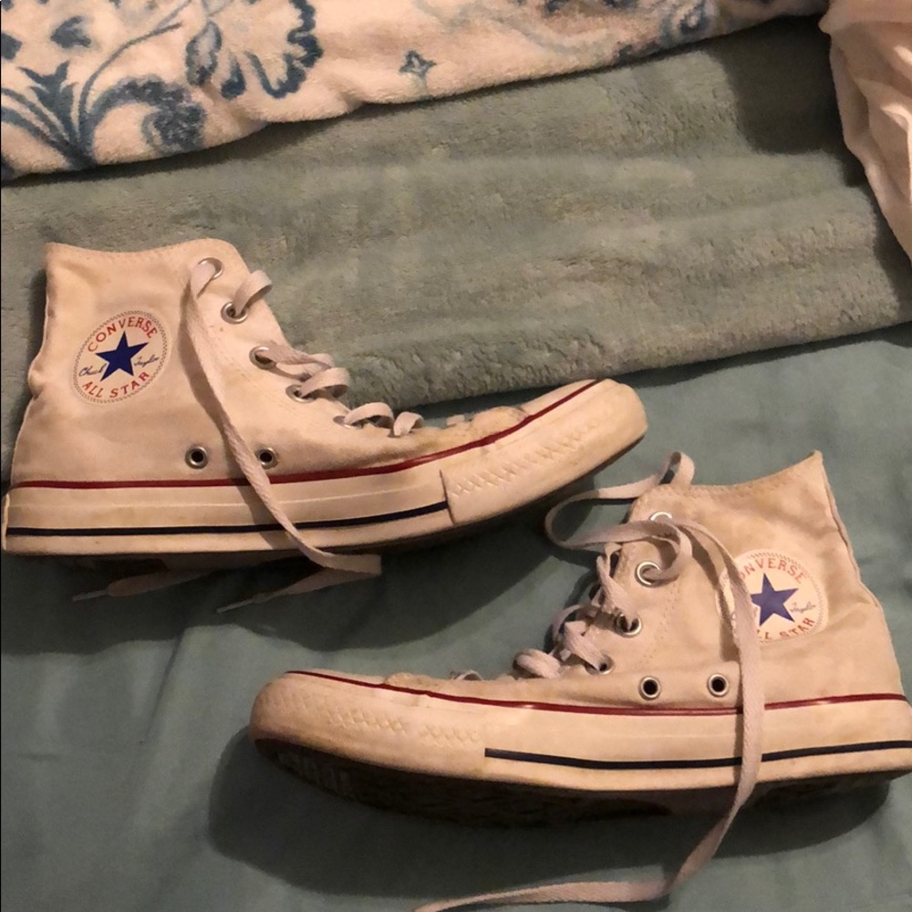 White Converse. Size 8. Has some stains on it.